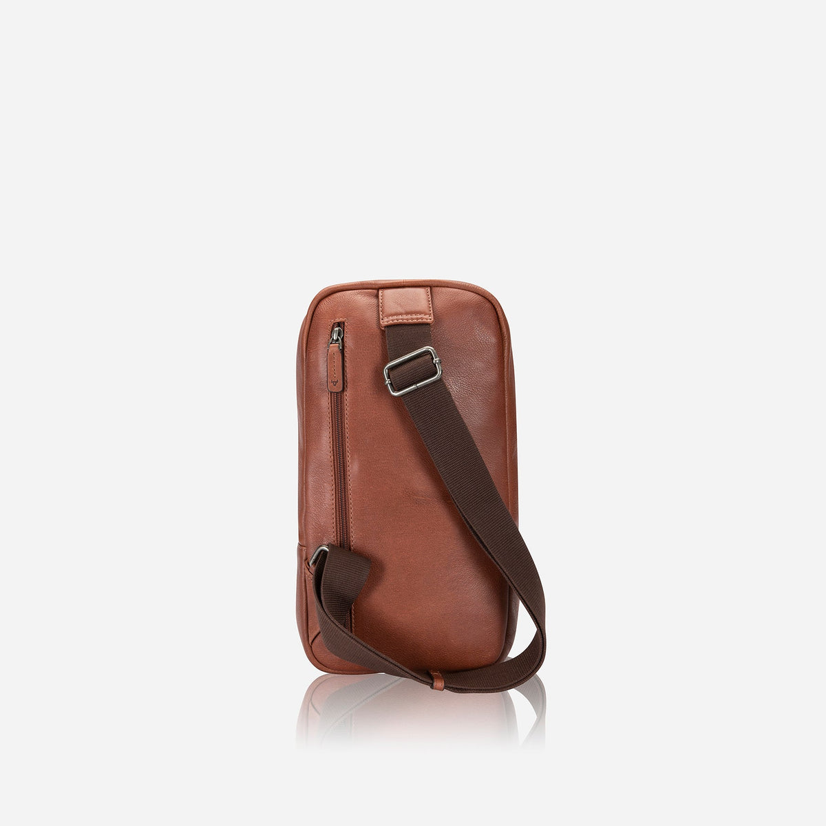 Back of the copper Kudu one strap backpack, with adjustable webbing sling strap across the panel